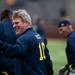 Blue Team quarterback BJ Dickey smiles and and gives a thumbs up toward the sidelines during the alumni spring flag football game on Saturday, April 13. AnnArbor.com I Daniel Brenner
